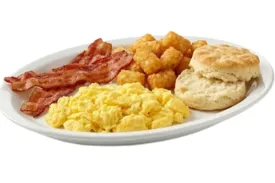 Country Breakfast Platter with eggs, hash browns, biscuit, and gravy