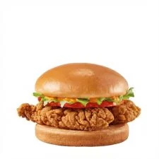 Crispy Chicken Sandwich on the Dairy Queen menu made with crispy chicken breast, lettuce, tomato, and sauce on a toasted bun