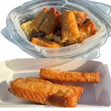 French Toast Platter with golden French toast, eggs, and breakfast meat