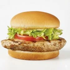 Grilled Chicken Sandwich on the Dairy Queen menu made with a grilled chicken breast, lettuce, tomato, and sauce on a toasted bun